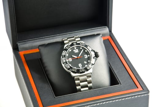 Wristwatch in the box on white background.