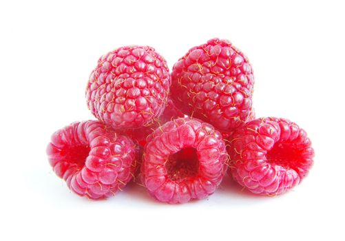 Ripe raspberry on a white background
