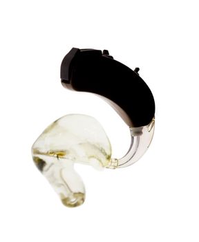 Single digital (behind-the-ear) hearing aid device with earmould and tubing on white in artificial style. 