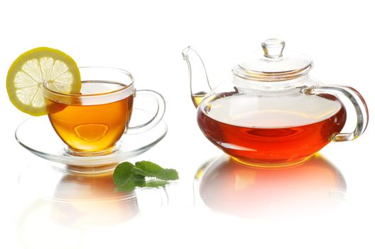 Tea being poured into glass tea cup