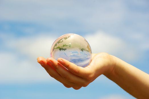 globe on the human hand