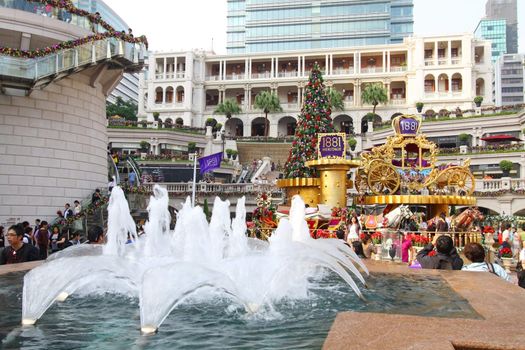 HONG KONG - NOV 13: Crowds gather at 1881 Heritage or former Marine Police Headquarters market square for Christmas decorations on 13 November, 2011. It is one of the most famous spot for seeing Christmas trees in Hong Kong.  