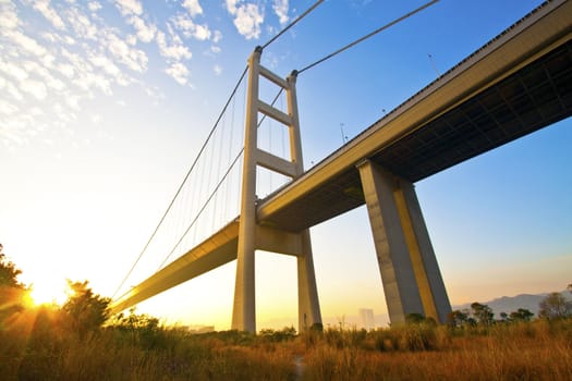 Tsing Ma Bridge in Hong Kong at sunset time