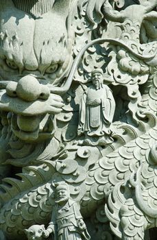 Sculptures of Chinese gods and dragons carved out of marble, Suphan Buri province, Thailand.