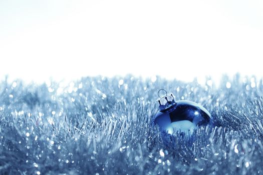 blue christmas ball on holiday background