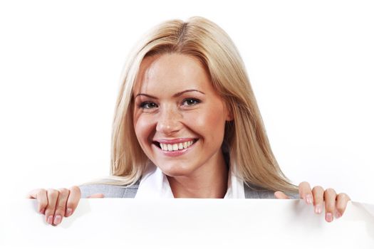 business woman hidden behind a white sheet of paper