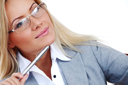 business woman in glasses on white background pen in hands