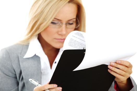 business woman hold a folder of papers  and write