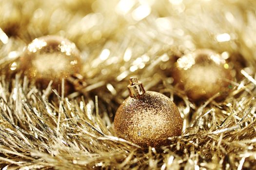 golden christmas ball on christmas background