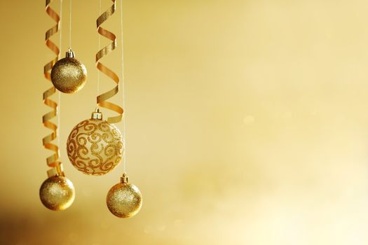 golden christmas balls on bokeh background