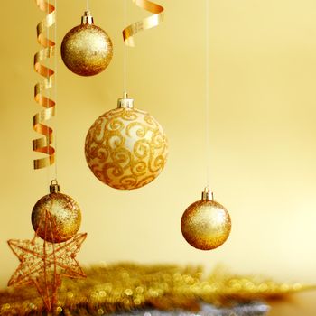 golden christmas balls on bokeh background