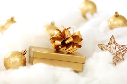 golden gifts on white close up