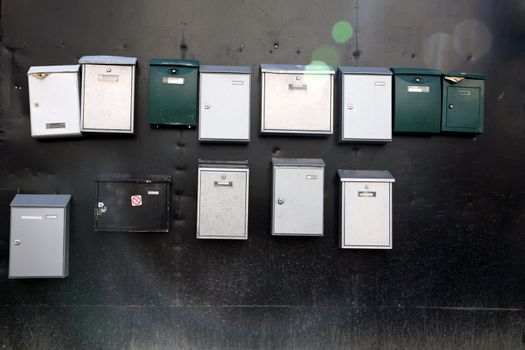 Composition of mailbox on a metallic door