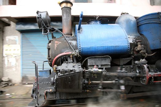 Train running in the streets of Darjeeling