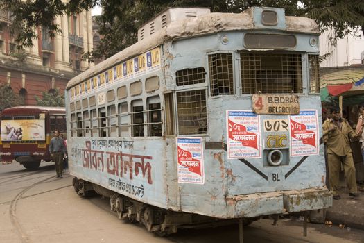 Old battered blue tram in Calcutta West Bengal India.