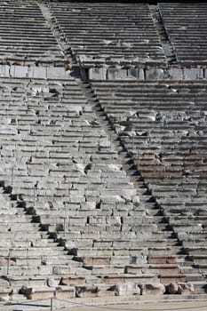 texture effect from the seats of ancient greek theatre of epidauros the lagest ancient theater still working