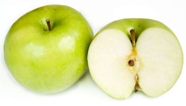 juicy green apple on a white background