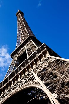 Classical beautiful view of The Eiffel Tower in Paris on a sunny day