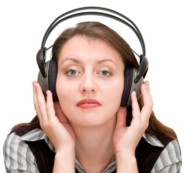beautiful girl in headphones listens to music