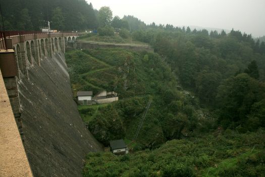 Dam in near Robertville village – gloomy day in Ardennes Mountain – Belgium.