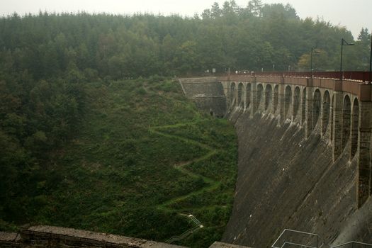 Dam in near Robertville village – gloomy day in Ardennes Mountain – Belgium.