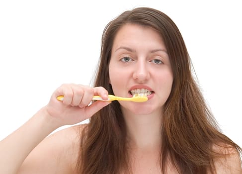 Beautiful girl about to brush her teeth, close up, isolated on white