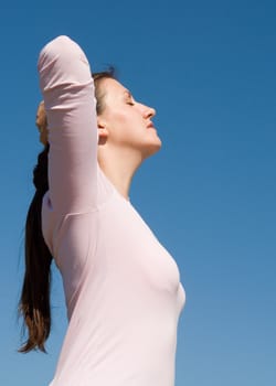 beautiful woman with sky at background