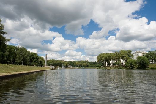 City quay with cloudy sky at background