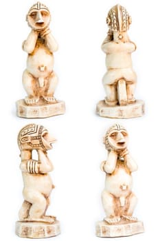 Small African figurine on a white background