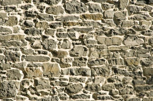 Gray primitive masonry rock stone wall background
