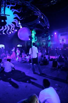 People jumping and dancing during a live concert