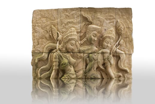 Traditional Thai stone carving on a wall - travel and tourism.