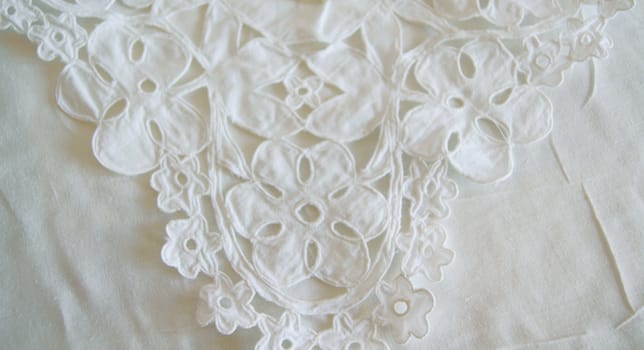 White lace with floral pattern on background                  