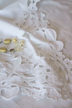 White lace with floral pattern on background                  