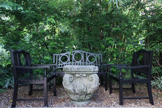 chairs on backyard tropical garden