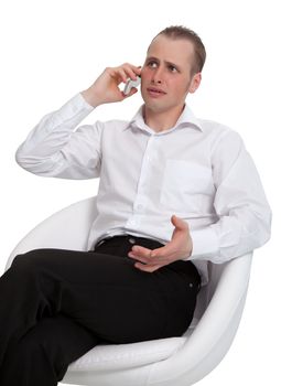 A businessman in a conversation on the phone solves the problem. Isolated on white background