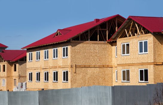 Construction of new two-storey houses made of wood