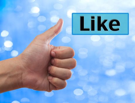 thumb up to Like button, social network concept