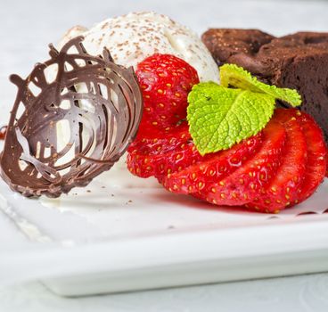 Chocolate flan with strawberries and chocolate, a wonderful dessert