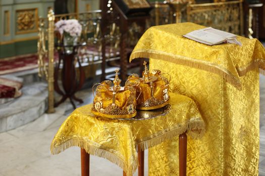 Two wedding crowns in the church