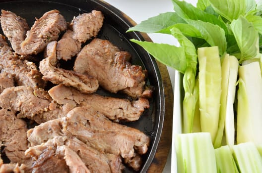 roasted beef fillet on a hot plate ,served with vegetable