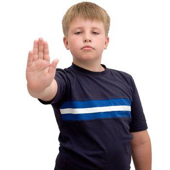 Image of young boy with hand outstretched, warding off any unwelcome situations