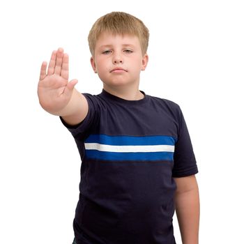 Image of young boy with hand outstretched, warding off any unwelcome situations