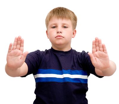 Image of young boy with hand outstretched, warding off any unwelcome situations