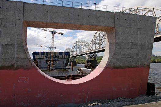 building of a new bridge over the river                             