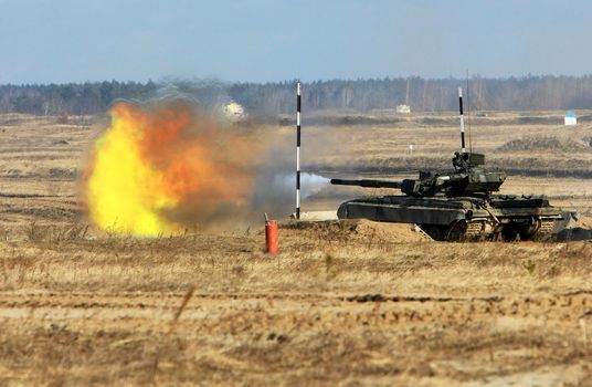 tank  shoot during the military training exercise