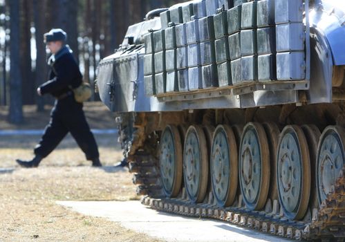 Tread on a military tank.