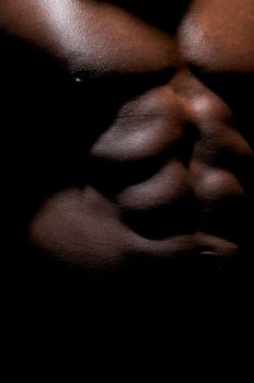 Close up of a worked abdominal of an African American Young.