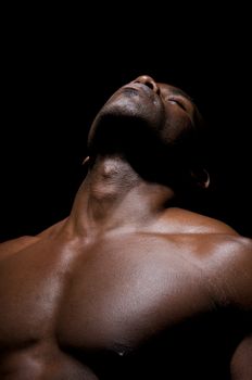 Close up of  worked pectorals of an African American Young.