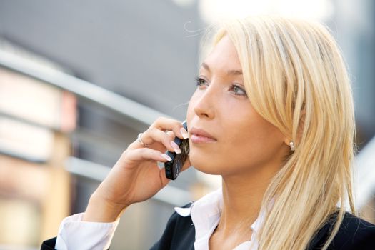 Businesswoman using mobile phone